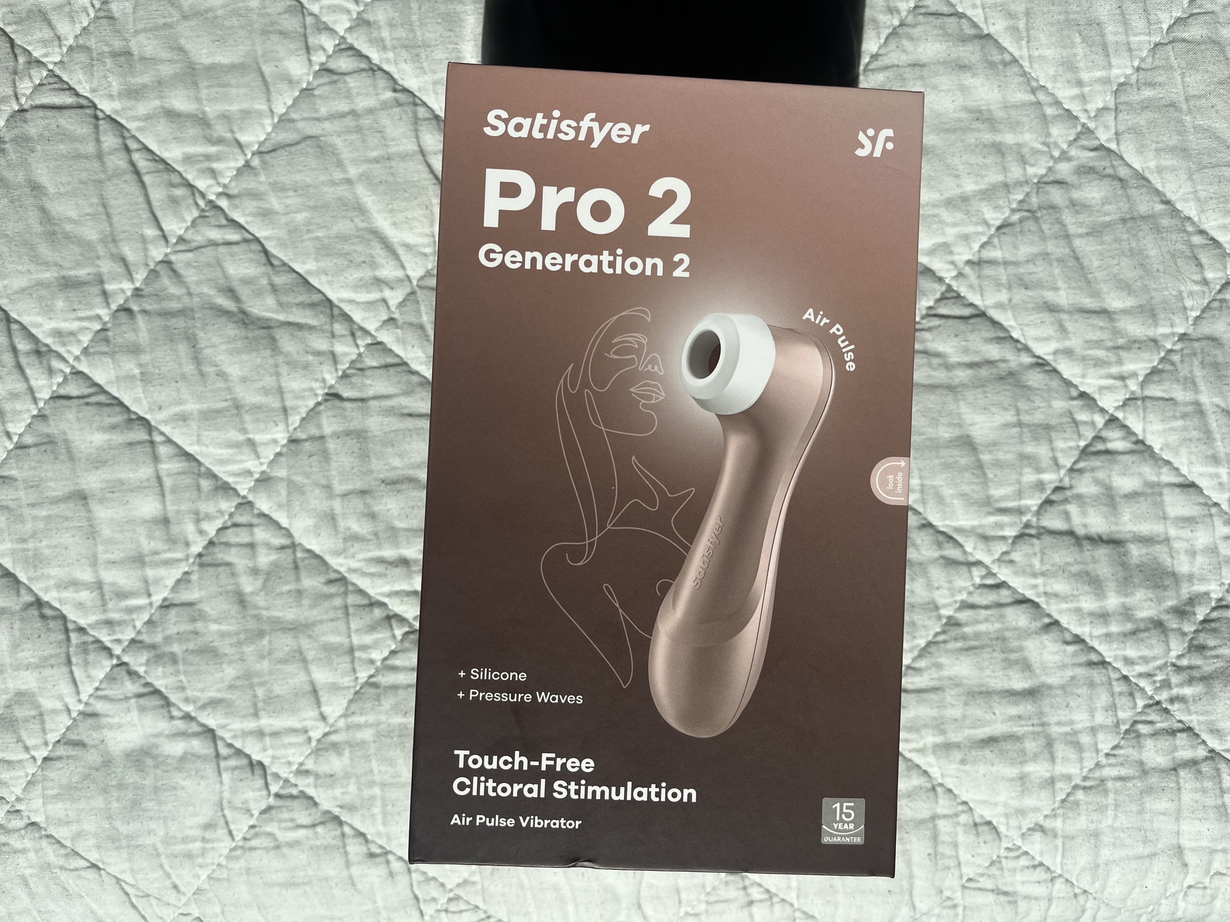 The Satisfyer pro 2 gen 2 box features the product on it, a suction toy with a white tip.