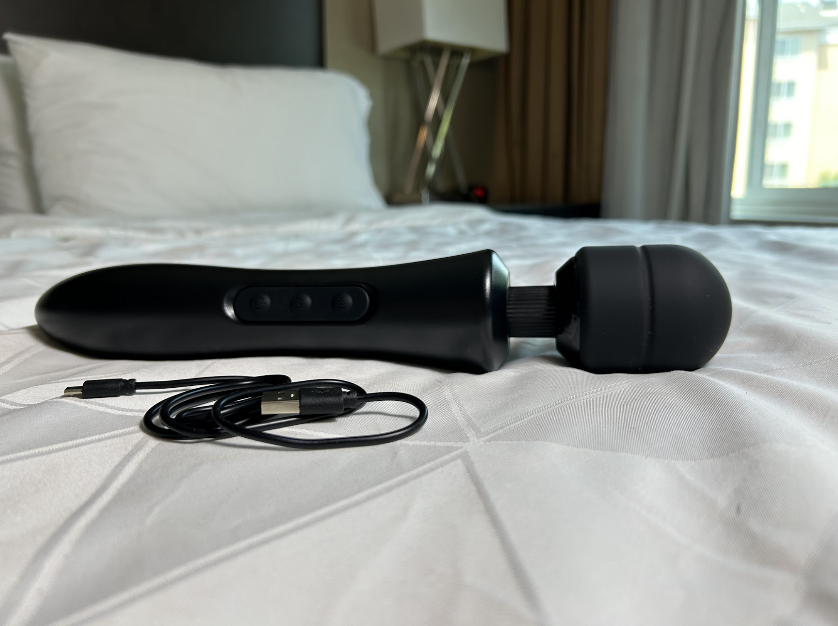 Pictured is the Funzze Super Powerful Massager and the USB cable charger that is included in the packaging. Pictured is the Funzze Super Powerful Massager and the USB cable charger that is included in the packaging.