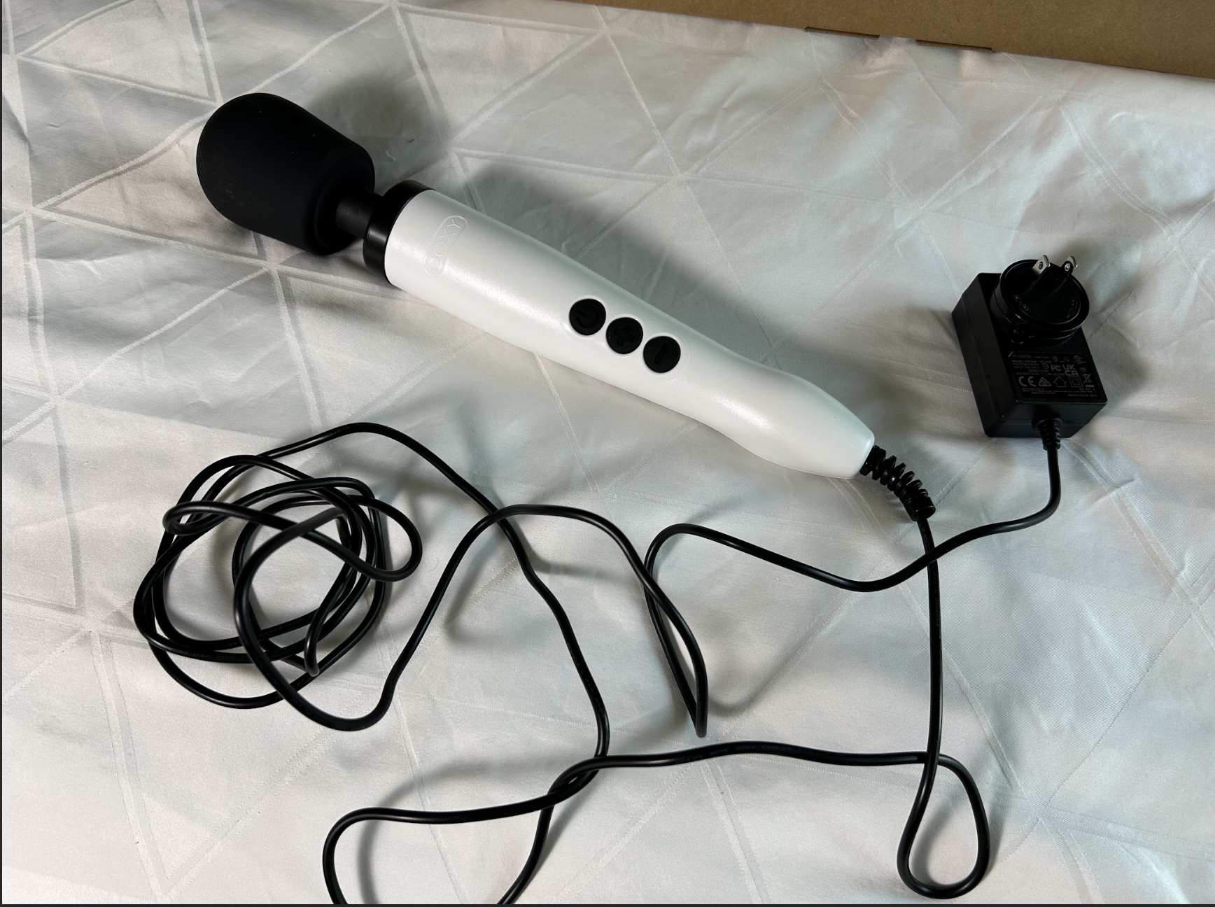 Pictured is the Doxy Original Massager with its attached cord. Pictured is the Doxy Original Massager with its attached cord.