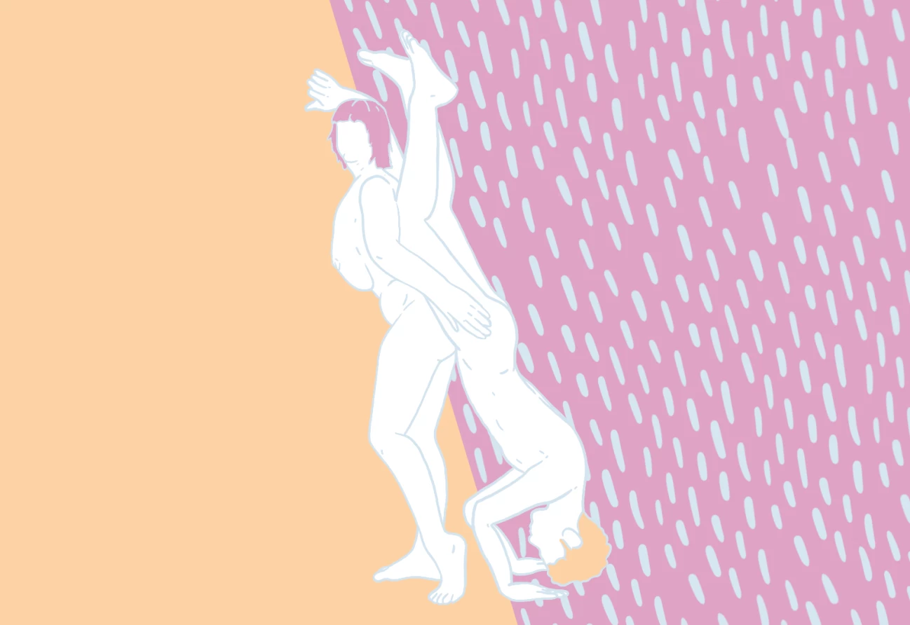 Someone is leaning against a surface while another person is behind them, doing a handstand, and inserting themselves