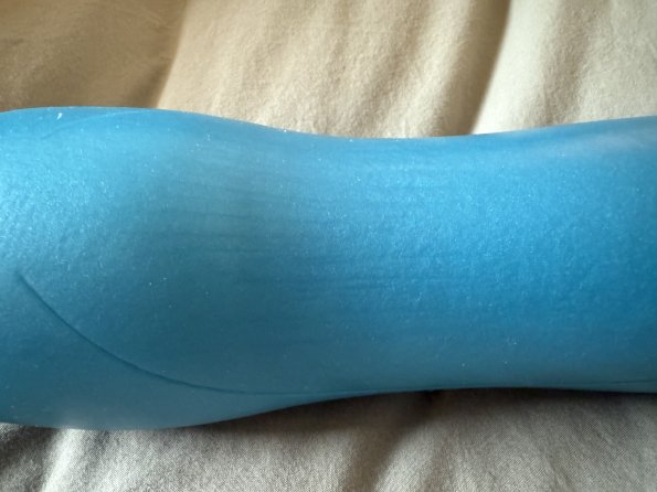 The shimmery blue coloring makes the sex toy pop, and showcases the silicone material unique to the product.