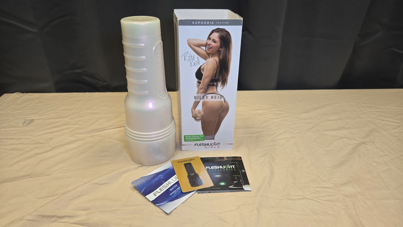 The Riley Reid butt Fleshlight box alongside the toy itself.