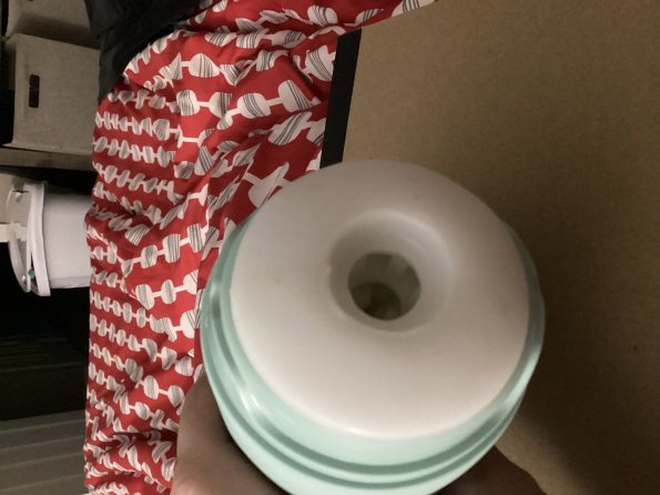 Pictured is the Tenga Puffy Mint Green Sleeve with its suction grip technology.