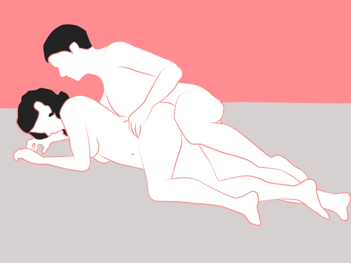A couple having spooning sex