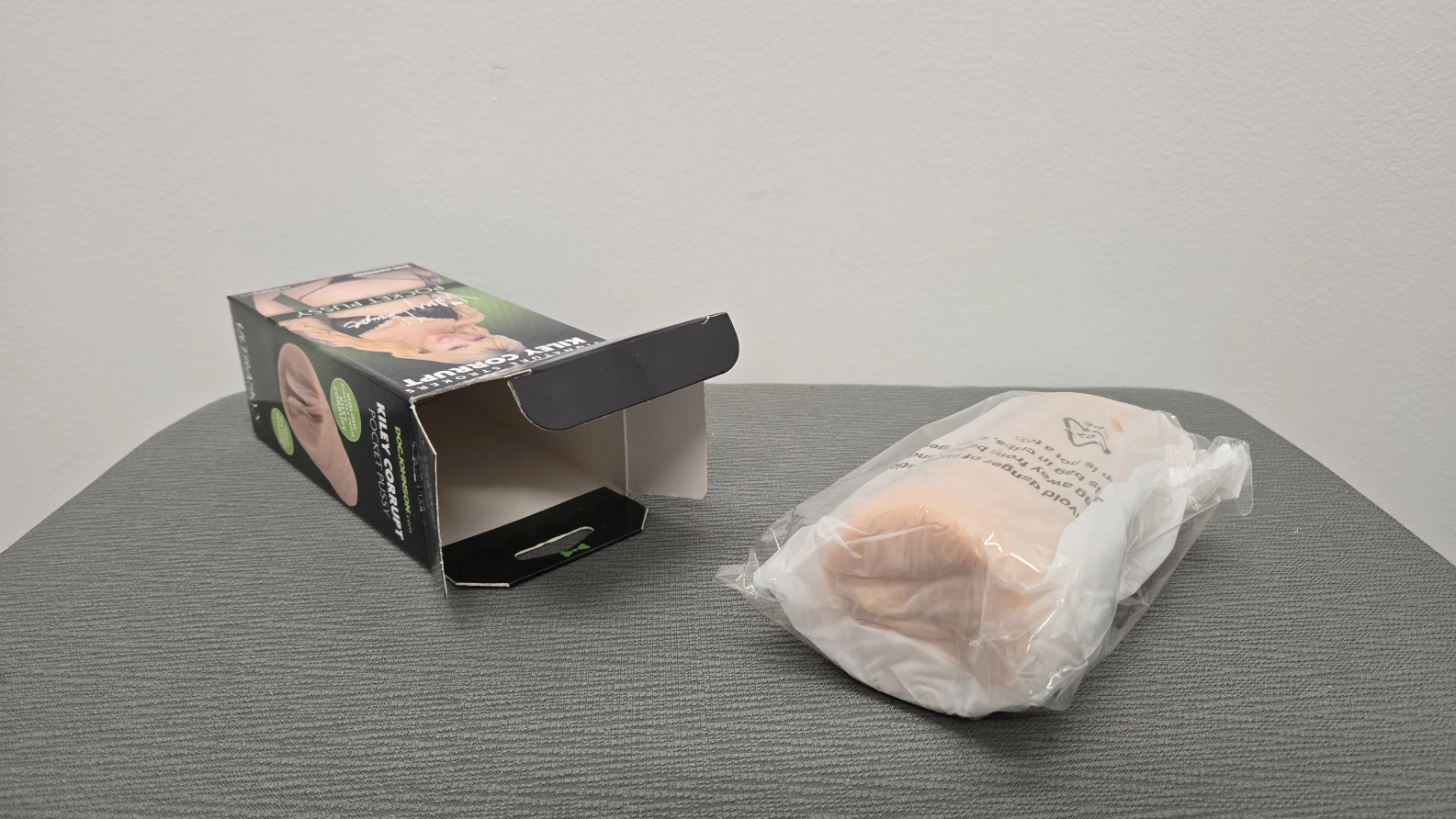 The Kiley corrupt sex toy in its bag