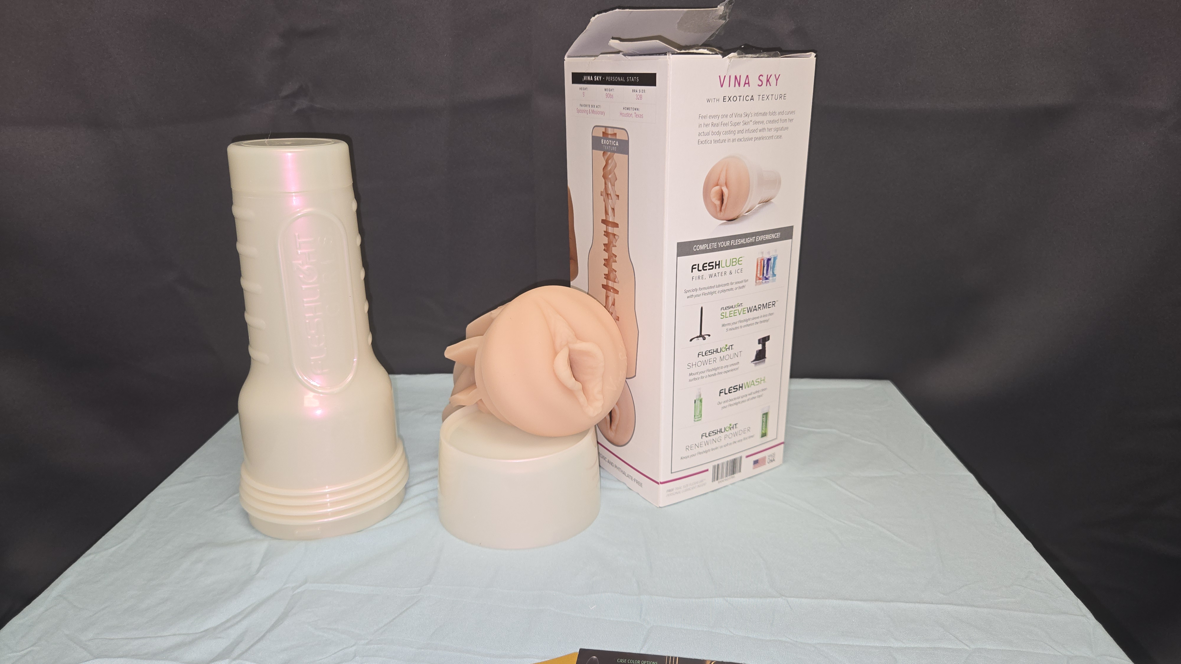 Pictured here is the Fleshlight Vina Sky Exotica sleeve, and packaging the showcases the unique features of this sex toy Pictured here is the Fleshlight Vina Sky Exotica sleeve, and packaging the showcases the unique features of this sex toy
