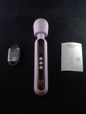 Pictured here is the Pure Envy Serenity Stick with an instruction manual and charging adapter. Pictured here is the Pure Envy Serenity Stick with an instruction manual and charging adapter.