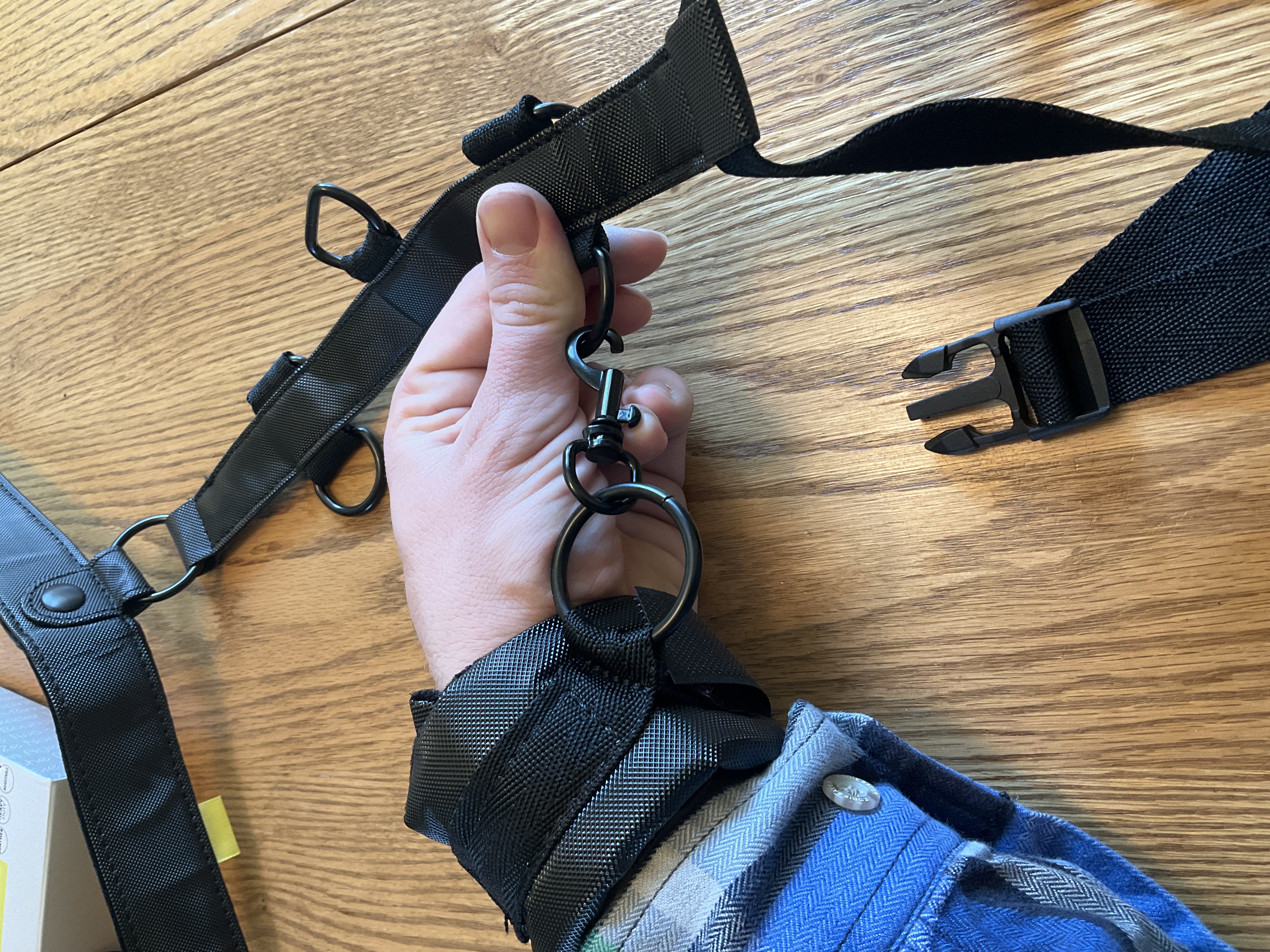 Featured is the snap hook and ring of the CalExotics Boundless Collar Body Restraint. Featured is the snap hook and ring of the CalExotics Boundless Collar Body Restraint.
