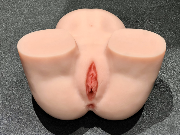 The Tantaly Brandi sex doll flay on a carpet.