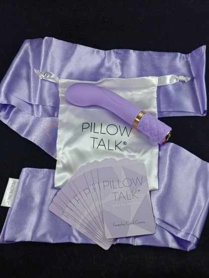 Pictured is the Pillow Talk Racy Special Edition Silicone G-Spot Vibrator, equipped with playing cards and a blindfold. Pictured is the Pillow Talk Racy Special Edition Silicone G-Spot Vibrator, equipped with playing cards and a blindfold.