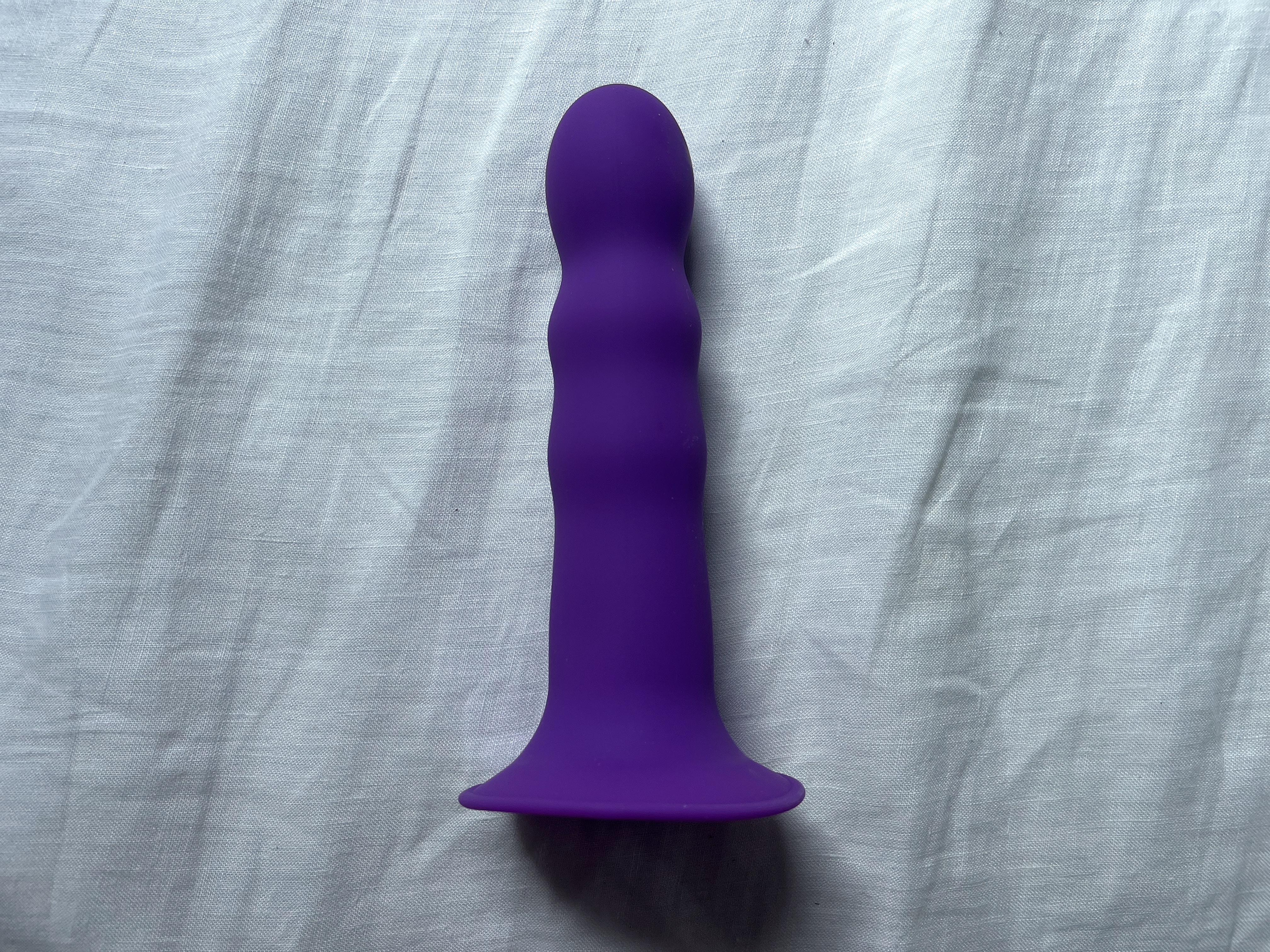 Pictured is the Squeeze-It Wavy Dildo. Pictured is the Squeeze-It Wavy Dildo.
