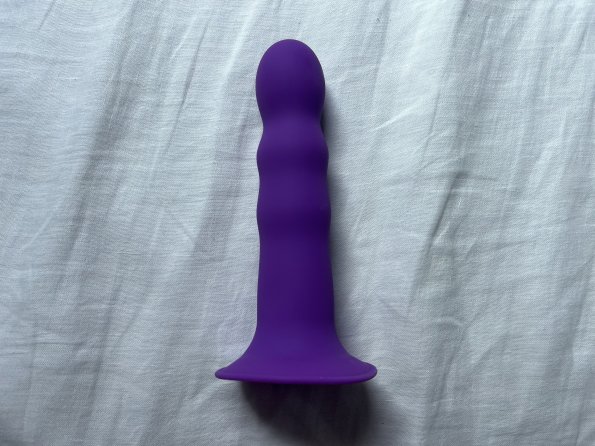 Pictured is the Squeeze-It Wavy Dildo. Pictured is the Squeeze-It Wavy Dildo.