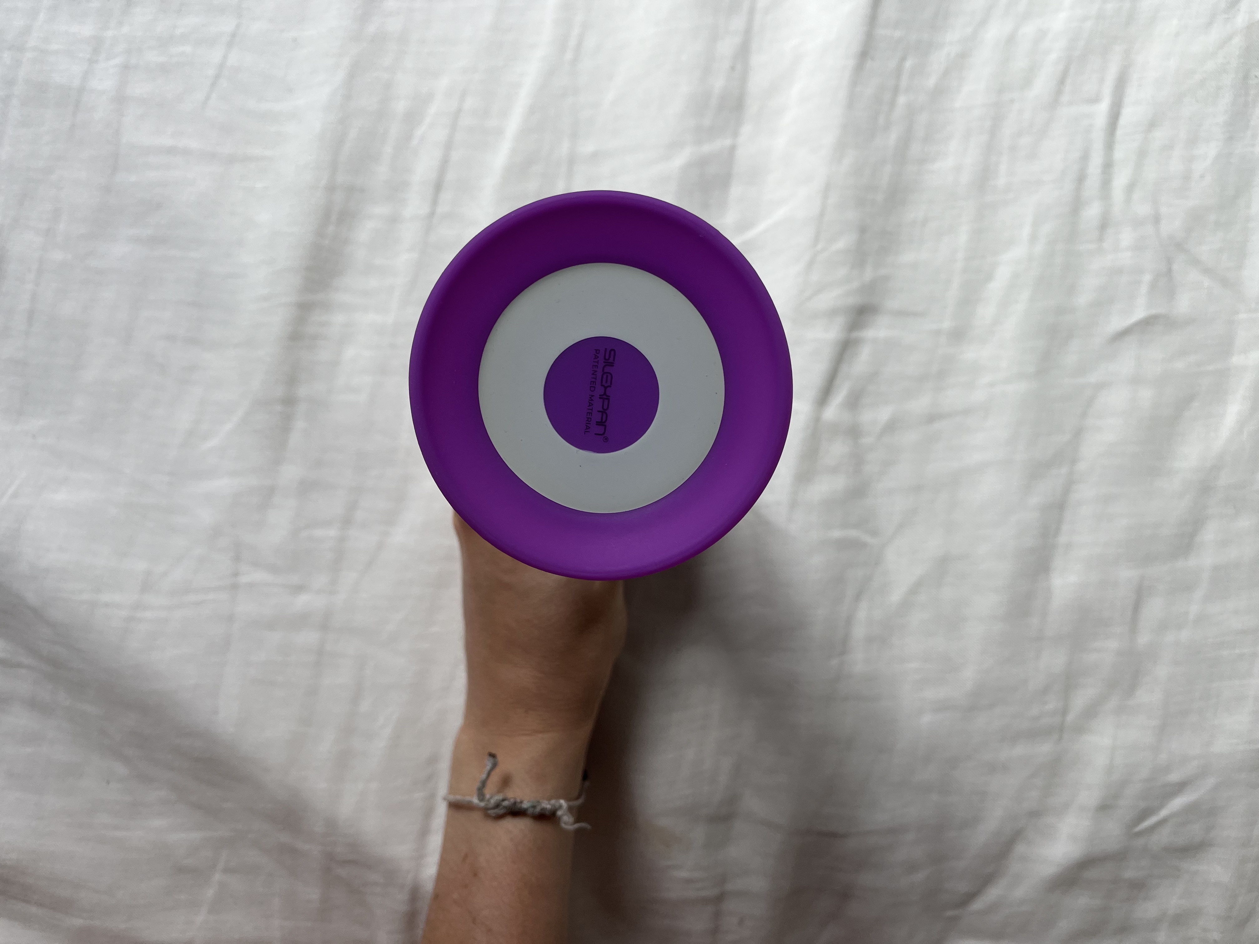 Pictured is the suction cup on the Squeeze-It Wavy Dildo. Pictured is the suction cup on the Squeeze-It Wavy Dildo.
