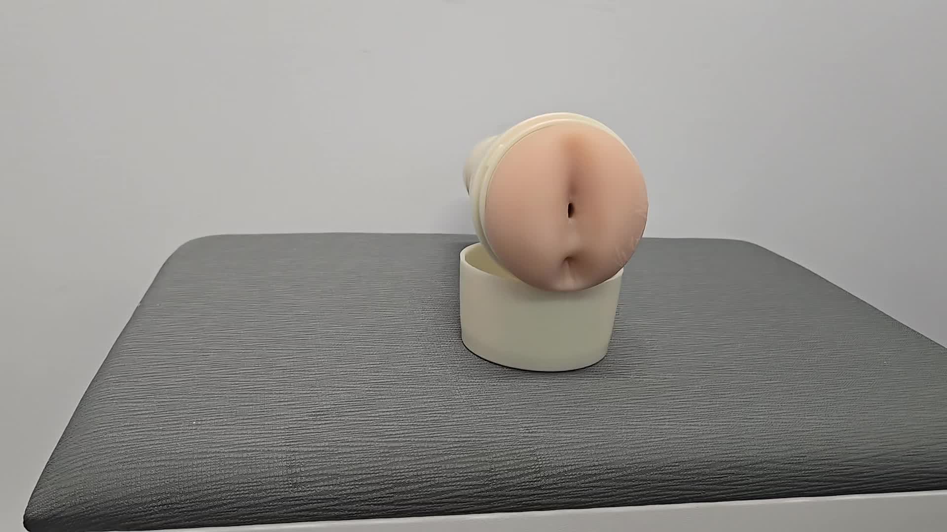 A shot panning around the Valentina Nappi Fleshlight product.