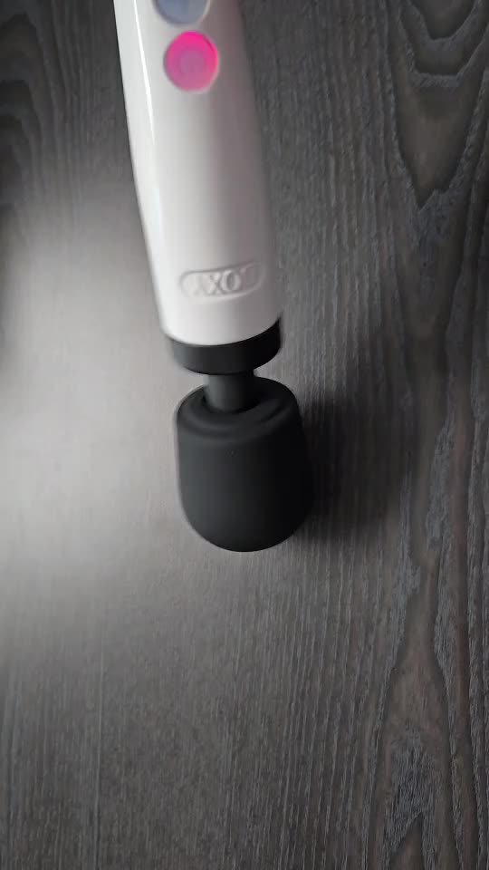The doxy die cast r vibrating on a black table.